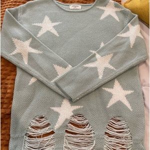 Boutique sweater.. never worn. Size xtra small but fits more like a medium.